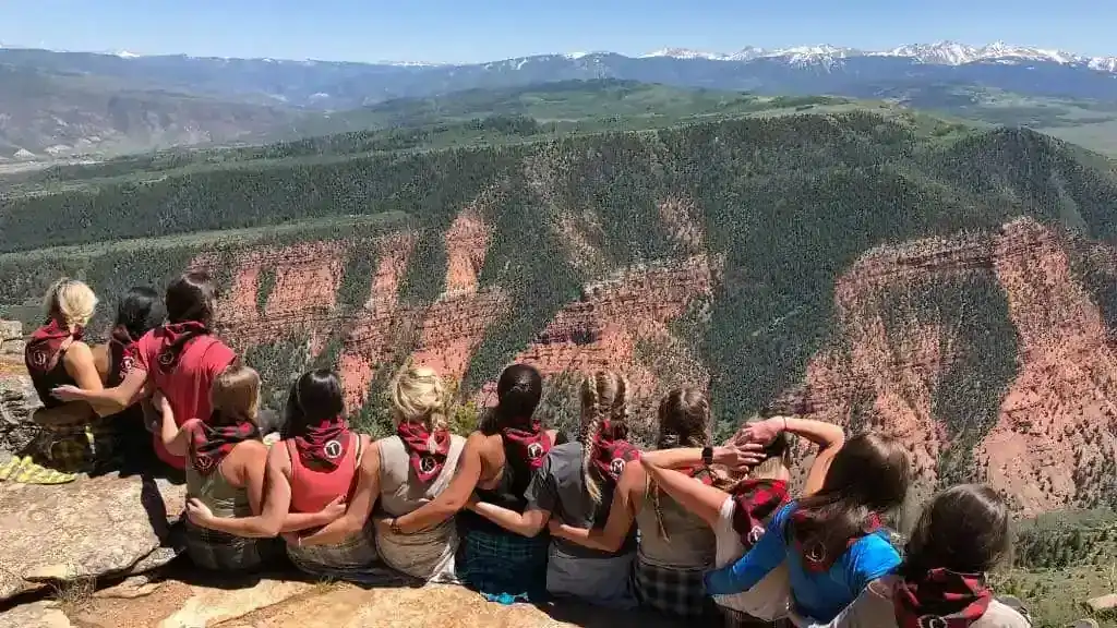 Group looking out over Colorado red rock canyons