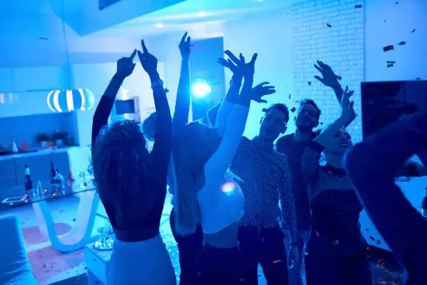 Friends dancing at a party