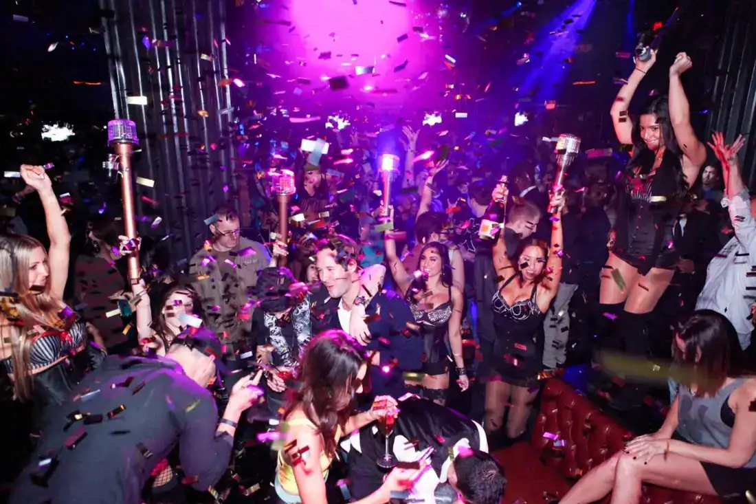 Packed dance floor with confetti